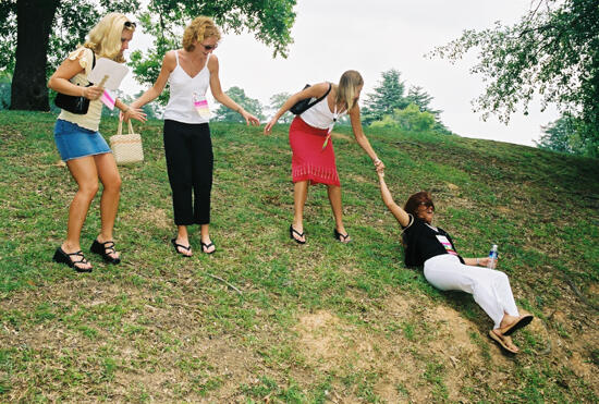 Four Phi Mus Walking Downhill at Convention Photograph, July 4-8, 2002 (image)