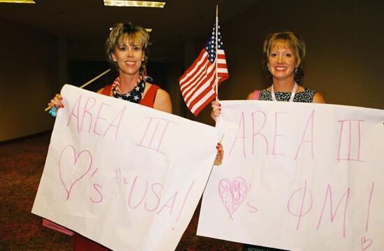 Area III Phi Mus With Signs at Convention Photograph 1, July 4, 2002 (image)