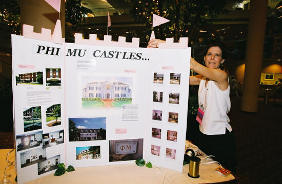 Phi Mu Setting Up Phi Mu Castles Convention Exhibit Photograph 2, July 4-8, 2002 (image)