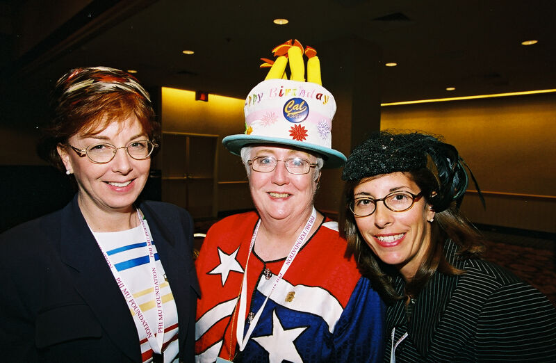 Campbell, Nemir, and Price Wearing Hats at Convention Photograph 1, July 4-8, 2002 (Image)