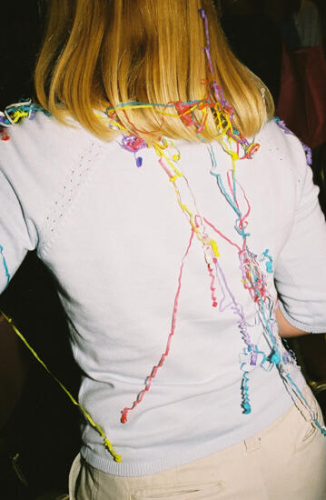 Confetti on the Back of a Phi Mu at Convention Photograph 2, July 4, 2002 (image)