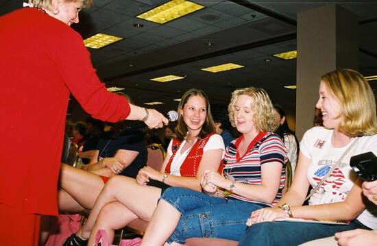 Lana Lewis Talking With Delegates at Convention Event Photograph 3, July 4-8, 2002 (image)