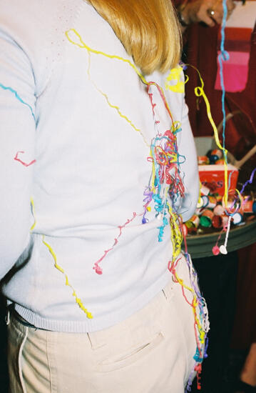 Confetti on the Back of a Phi Mu at Convention Photograph 1, July 4, 2002 (image)