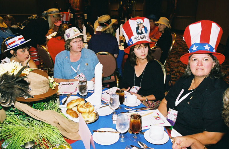 Four Phi Mus at Convention Officers' Luncheon Photograph, July 4-8, 2002 (Image)