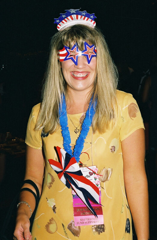 Unidentified Phi Mu in Star Glasses at Convention Photograph, July 4, 2002 (Image)