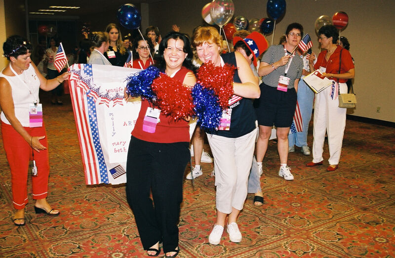 Molly Sorenson and Unidentified Phi Mu Cheerleading at Convention Photograph 2, July 4, 2002 (Image)