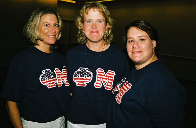 Three Members in Phi Mu Shirts at Convention Photograph, July 4-8, 2002 (Image)