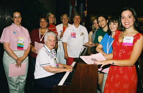 Convention Choir Gathered Around Piano Photograph 2, July 4-8, 2002 (image)