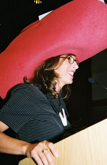 Gayle Price Wearing Large Hat at Convention Officers' Luncheon Photograph 2, July 4-8, 2002 (image)