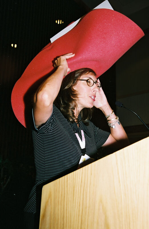 Gayle Price Wearing Large Hat at Convention Officers' Luncheon Photograph 3, July 4-8, 2002 (Image)