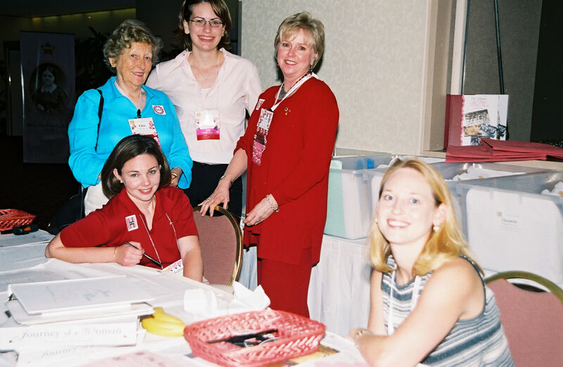 Rawson, Lewis, and Three Unidentified Phi Mus During Convention Registration Photograph, July 4-8, 2002 (Image)