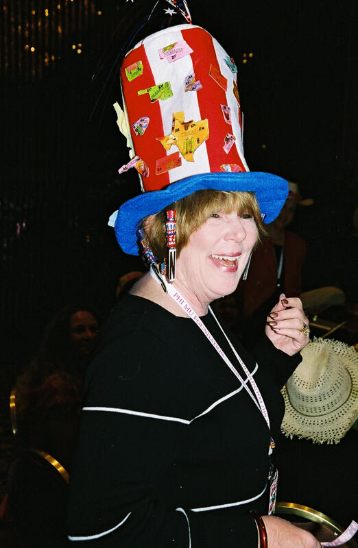 July 4-8 Dusty Manson Wearing Large Hat at Convention Photograph Image