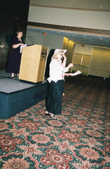 Mary Jane Johnson and Cathy Moore Speaking at Convention Officers' Luncheon Photograph, July 4-8, 2002 (image)