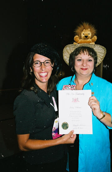 Gayle Price and Kathy Williams With Certificate at Convention Photograph 2, July 4-8, 2002 (image)