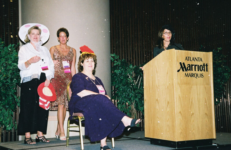 Moore, Wooley, Johnson, and Price Onstage at Convention Officers' Luncheon Photograph, July 4-8, 2002 (Image)
