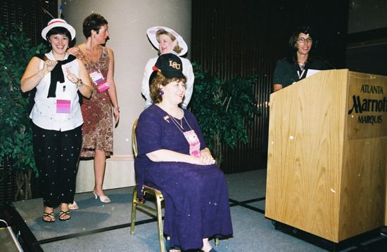 Unidentified, Moore, Wooley, Johnson, and Price Onstage at Convention Officers' Luncheon Photograph, July 4-8, 2002 (image)