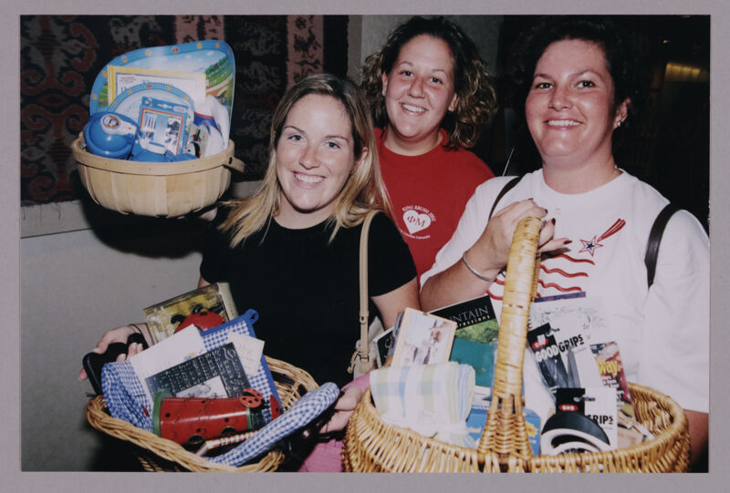 Three Phi Mus With Baskets at Convention Photograph, July 4-8, 2002 (Image)