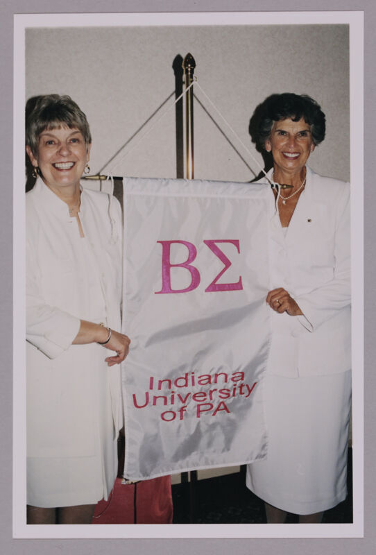 July 4-8 Unidentified and Pat Sackinger With Beta Sigma Chapter Banner at Convention Photograph 1 Image