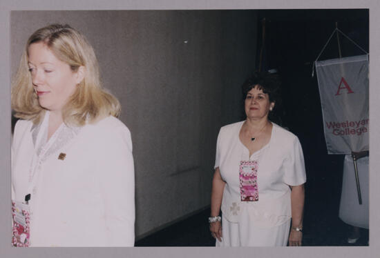 Cindy Lowden and Mary Jane Johnson in Convention Parade of Banners Photograph, July 4-8, 2002 (image)