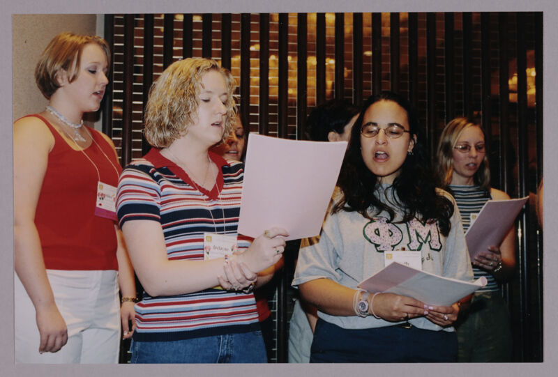 Shelly Bloom, Karen Jones, and Others Singing in Convention Choir Photograph 1, July 4-8, 2002 (Image)