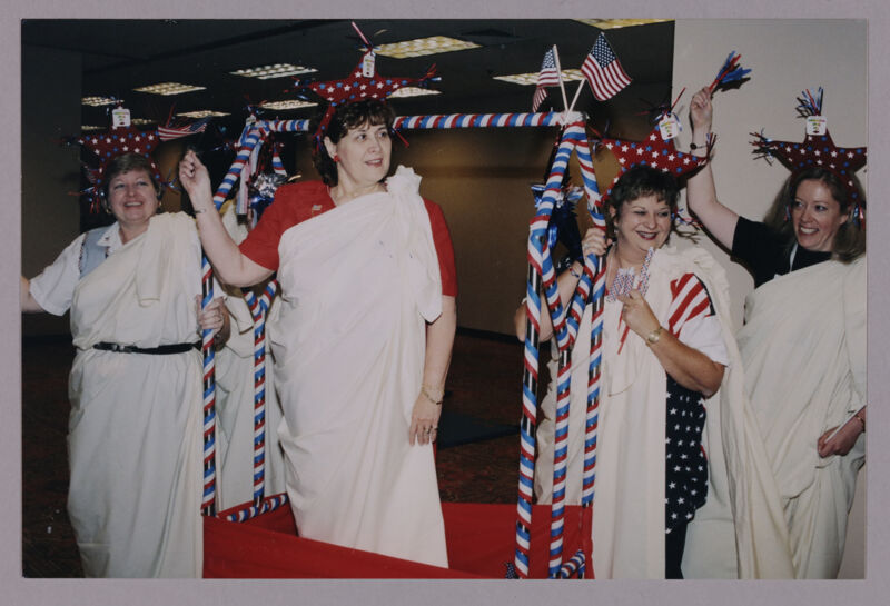 Noone, Johnson, Williams, and Lowden in Patriotic Costumes at Convention Photograph, July 4, 2002 (Image)