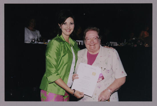 Susan Kendricks and Patricia Giles With Certificate at Convention Photograph, July 4-8, 2002 (image)