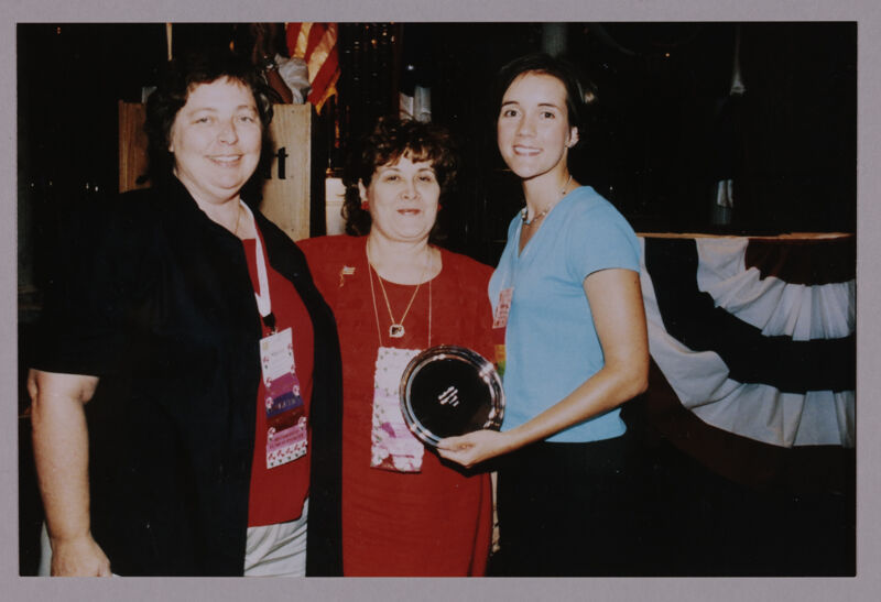 Henson, Johnson, and Unidentified With Award at Convention Photograph, July 4-8, 2002 (Image)