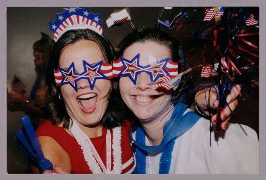 Two Phi Mus Wearing Star Glasses at Convention Photograph 1, July 4, 2002 (image)