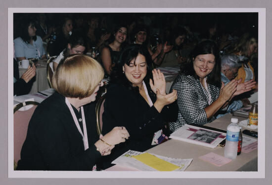 Dusty Manson and Monica Amor Applauding at Convention Photograph 1, July 4-8, 2002 (image)