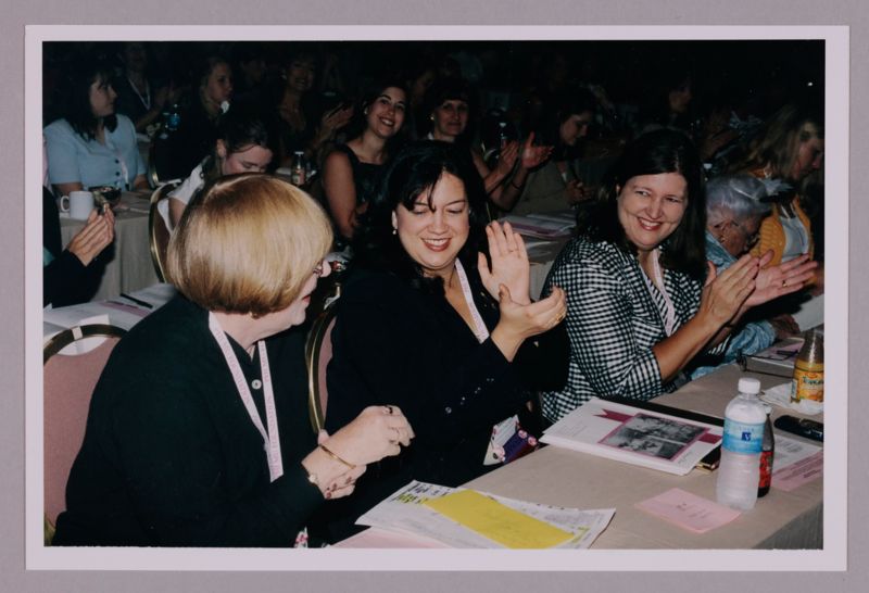 July 4-8 Dusty Manson and Monica Amor Applauding at Convention Photograph 1 Image