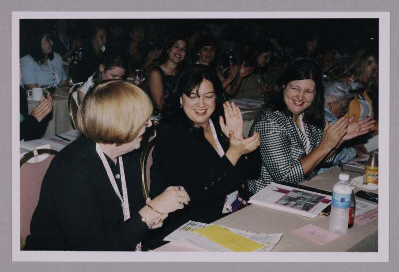 Dusty Manson and Monica Amor Applauding at Convention Photograph 1, July 4-8, 2002 (Image)