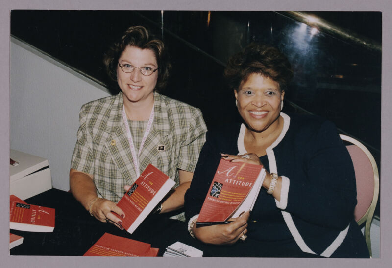 Frances Mitchelson and Patricia Russell-McCloud With Books at Convention Photograph, July 4-8, 2002 (Image)