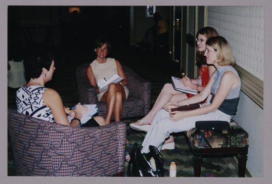 Jenn Wooley and Others in Discussion at Convention Photograph, July 4-8, 2002 (image)