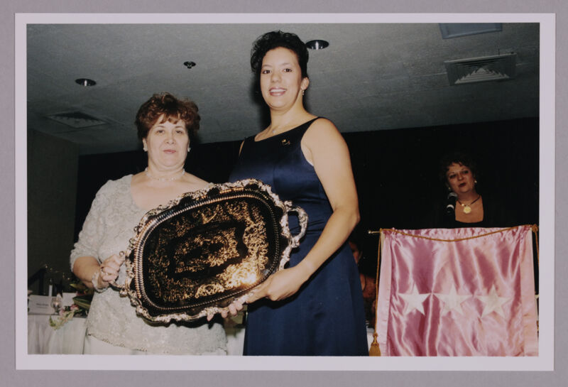Mary Jane Johnson and Unidentified With Award at Convention Photograph 1, July 4-8, 2002 (Image)