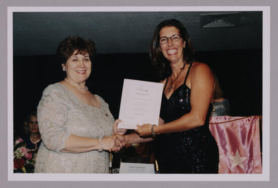 Mary Jane Johnson and Houston Alumnae Chapter Member With Certificate at Convention Photograph 1, July 4-8, 2002 (image)