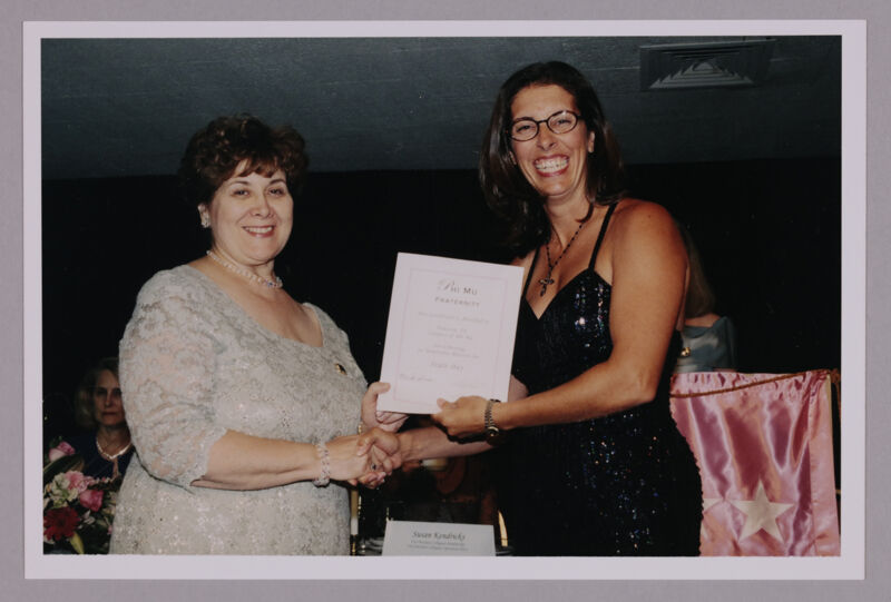 Mary Jane Johnson and Houston Alumnae Chapter Member With Certificate at Convention Photograph 1, July 4-8, 2002 (Image)