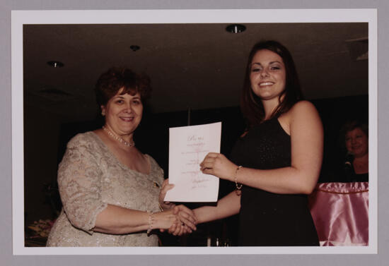 Mary Jane Johnson and Alpha Eta Chapter Member With Certificate at Convention Photograph, July 4-8, 2002 (image)