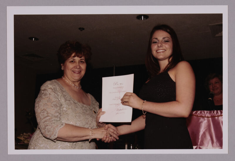 Mary Jane Johnson and Alpha Eta Chapter Member With Certificate at Convention Photograph, July 4-8, 2002 (Image)