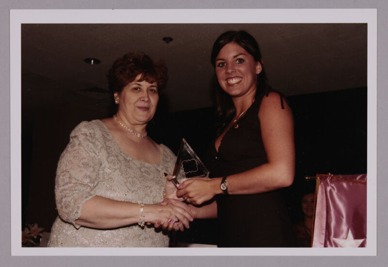 Mary Jane Johnson and Unidentified With Award at Convention Photograph 3, July 4-8, 2002 (Image)