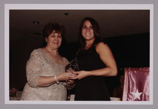 Mary Jane Johnson and Unidentified With Award at Convention Photograph 4, July 4-8, 2002 (image)