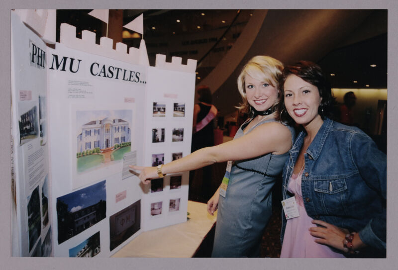Two Phi Mus by Housing Display at Convention Photograph 1, July 4-8, 2002 (Image)