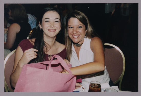 Two Phi Mus With Pink Bag at Convention Photograph 1, July 4-8, 2002 (image)