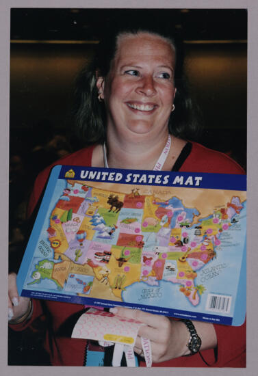 Phi Mu Holding United States Mat at Convention Photograph, July 4-8, 2002 (image)