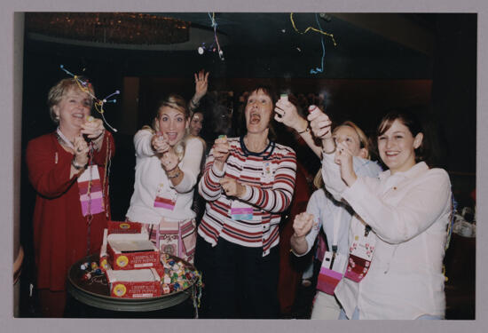 Lana Lewis and Others Set Off Poppers at Convention Photograph 1, July 4, 2002 (image)