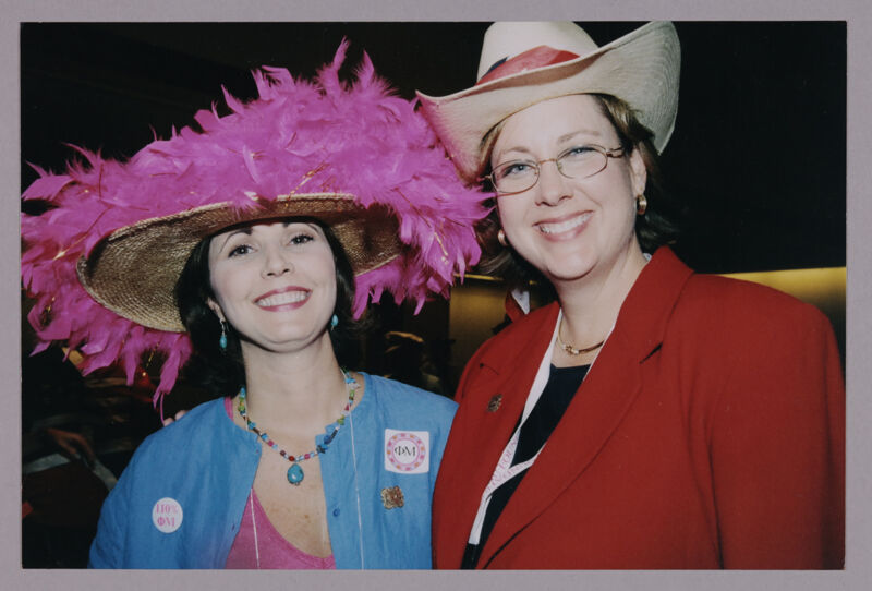 Susan Kendricks and Janeen Judah Wearing Hats at Convention Photograph, July 4-8, 2002 (Image)