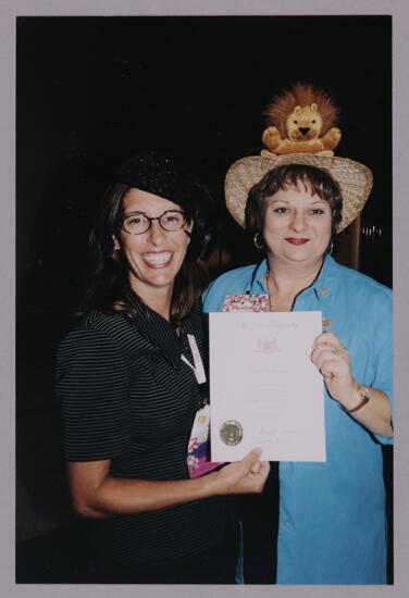 Gayle Price and Kathy Williams With Certificate at Convention Photograph 1, July 4-8, 2002 (image)