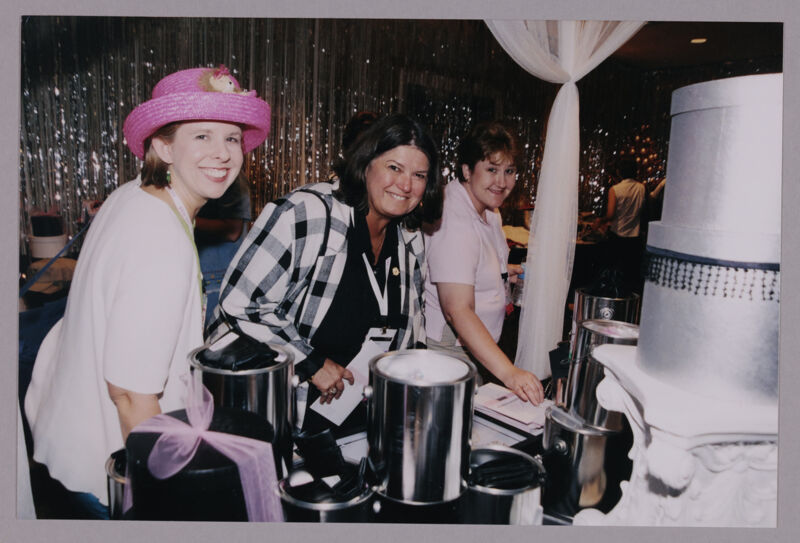Three Phi Mus by Canisters at Convention Photograph 1, July 4-8, 2002 (Image)