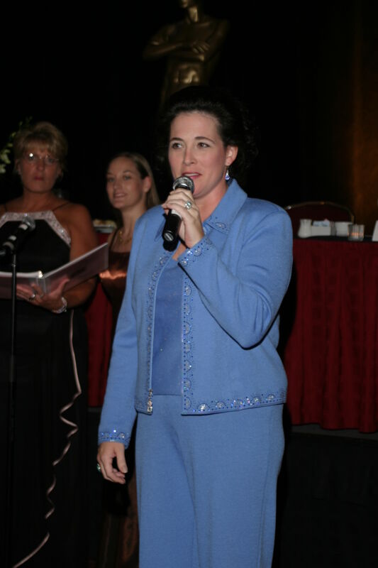 Mary Helen Griffis Singing at Convention Carnation Banquet Photograph 1, July 11, 2004 (Image)