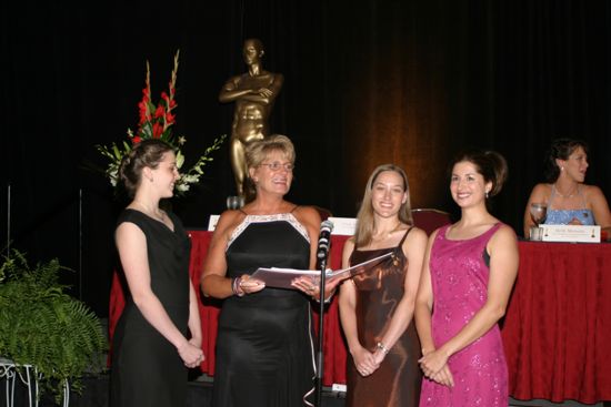 Four Phi Mus Singing at Convention Carnation Banquet Photograph, July 11, 2004 (image)