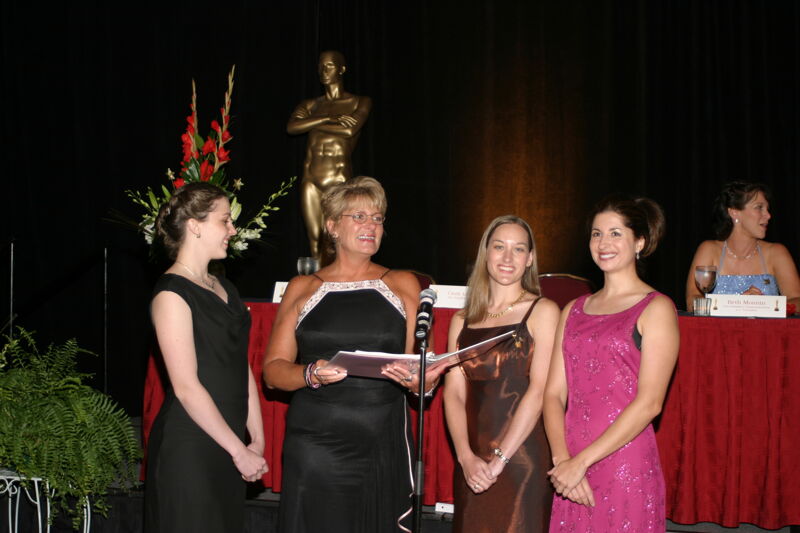 Four Phi Mus Singing at Convention Carnation Banquet Photograph, July 11, 2004 (Image)